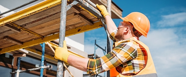 Construction worker on scaffolding