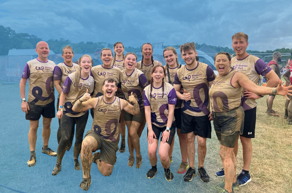 PIB Risk Management team after completing the Tough Mudder charity event for Weston Park Cancer Charity.