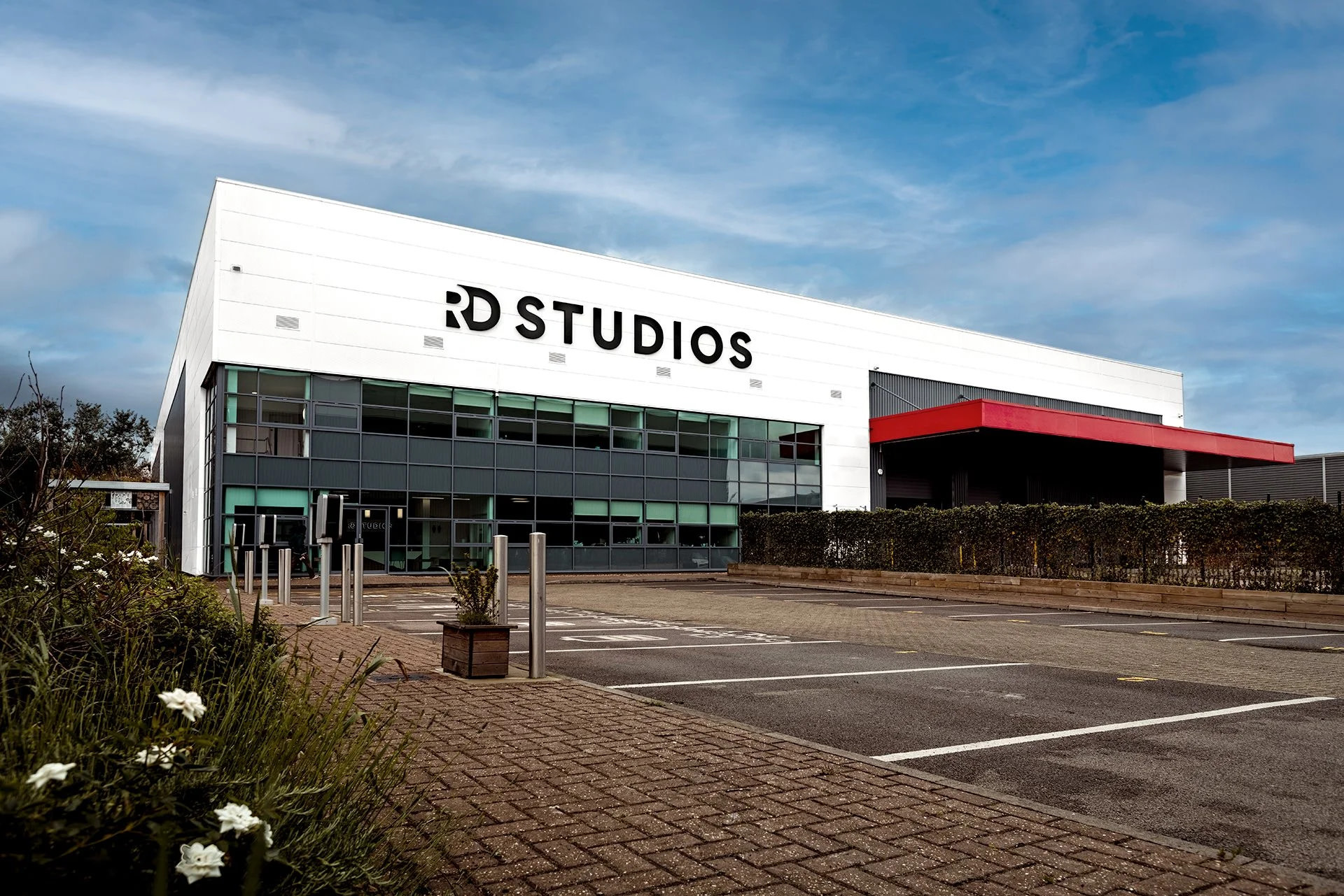 Exterior of RD Studios building with modern facade and signage
